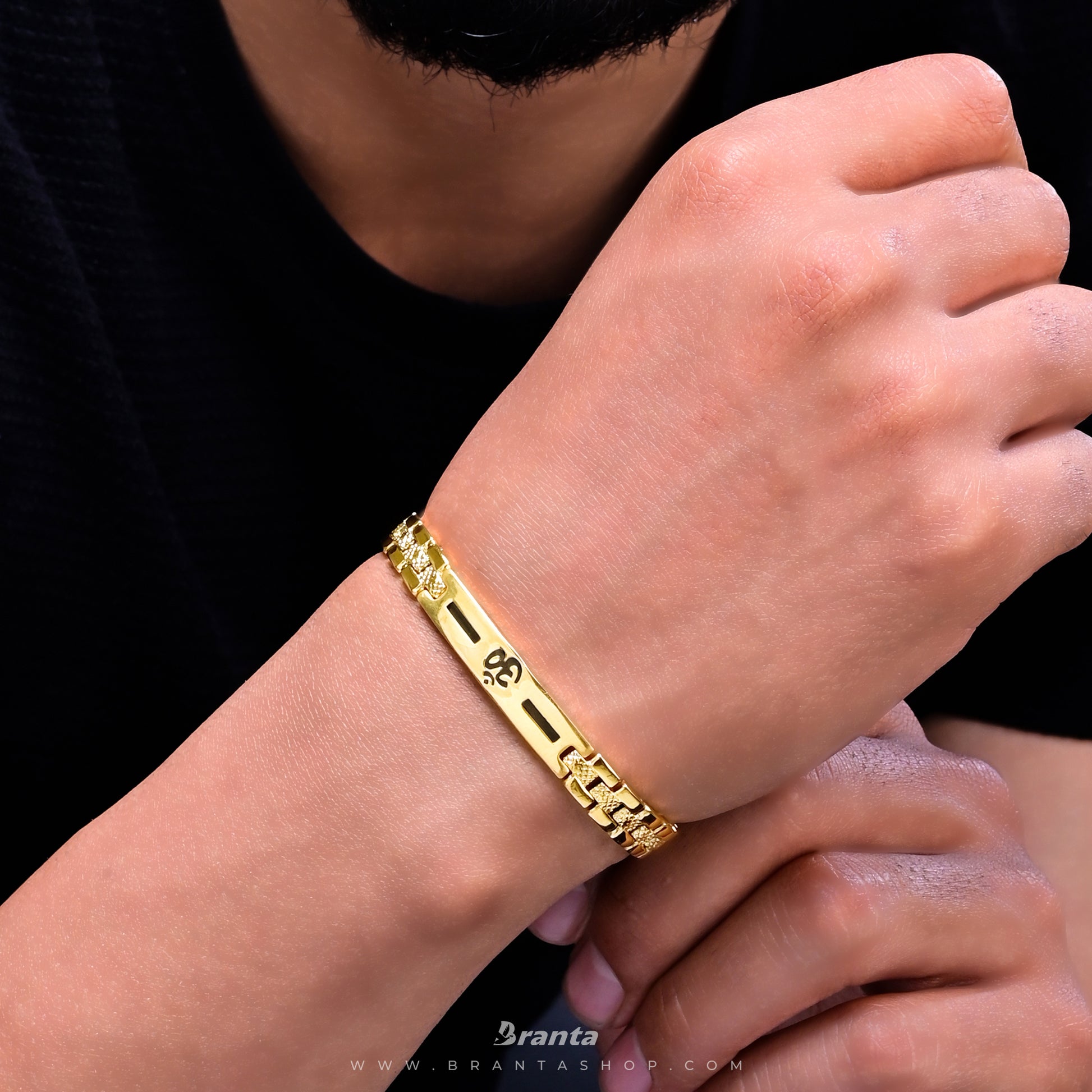 om bracelet gold